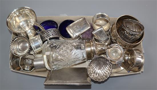 A group of small silver dishes, scent bottle top, an inkwell, sewing related items, vestas, etc.